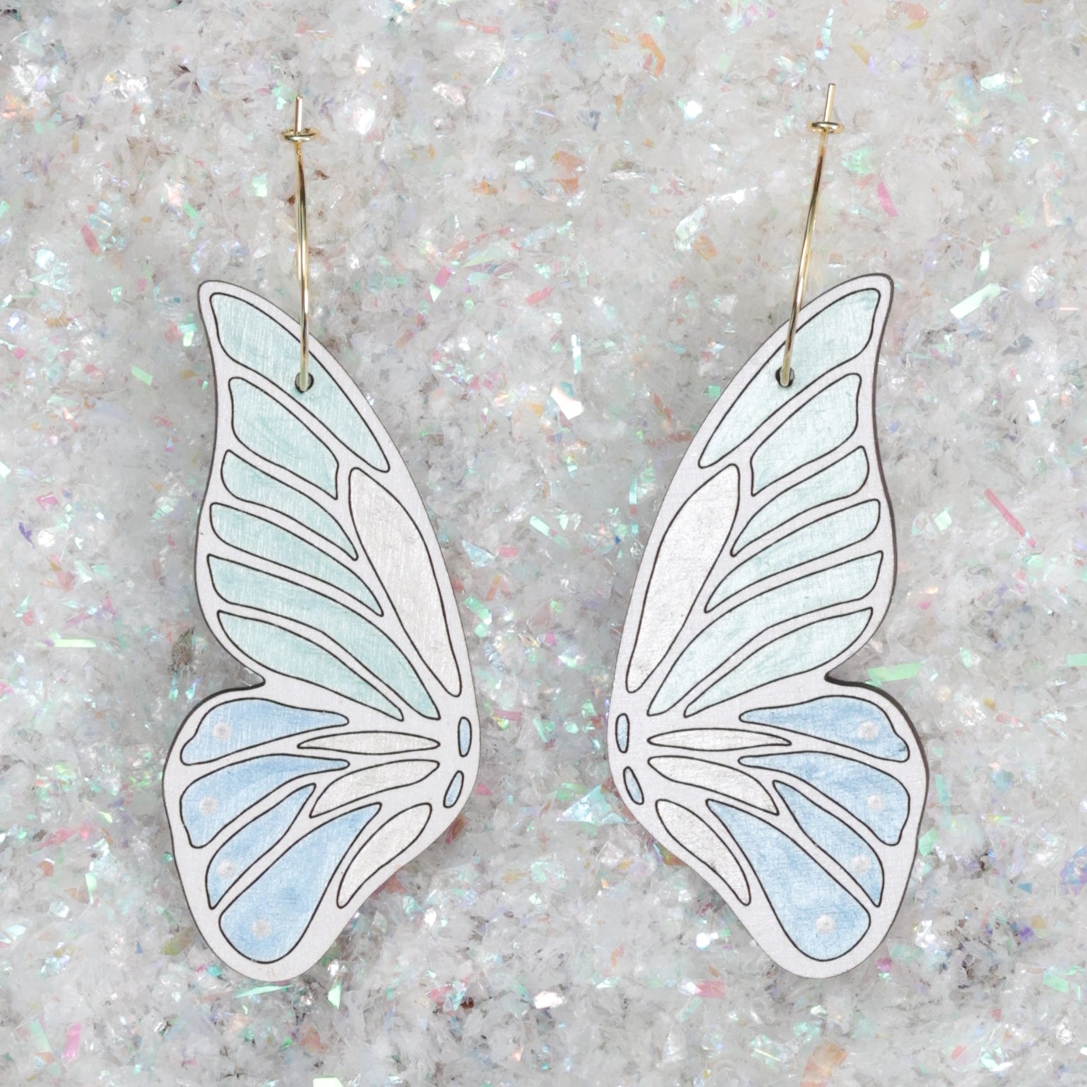 Silver butterfly store hoops