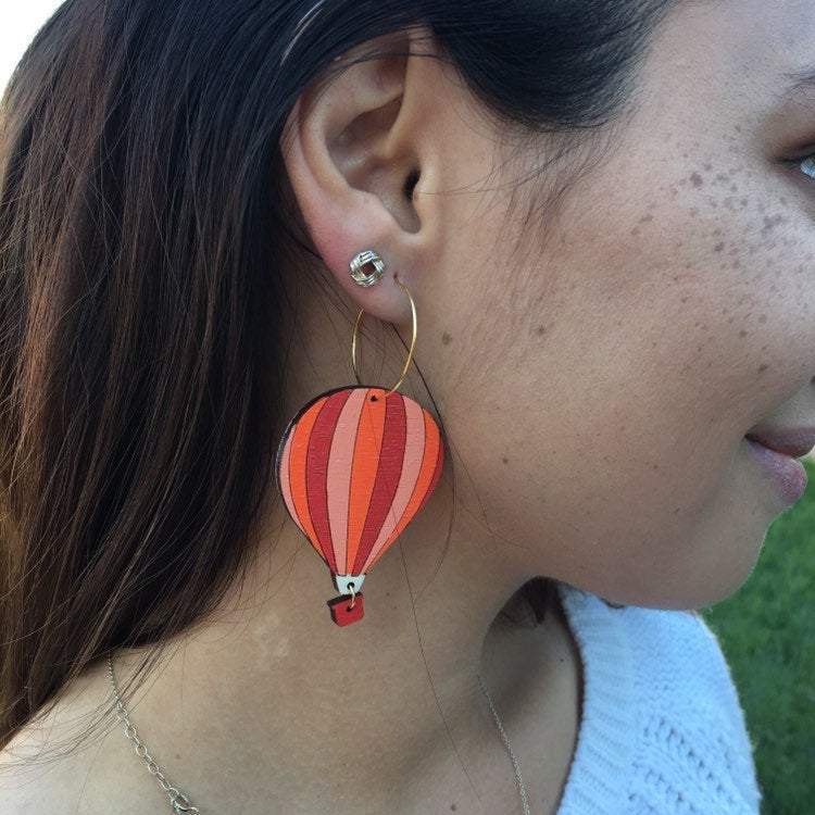 Girl Wearing Hot Air Balloon Earrings