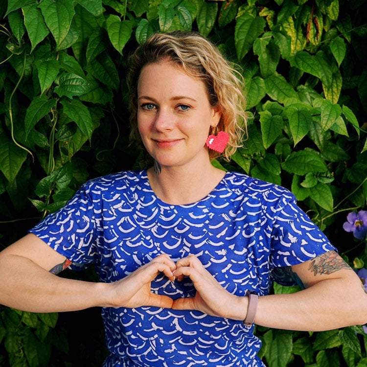 Girl wearing Pixelated Heart Hoop Earrings
