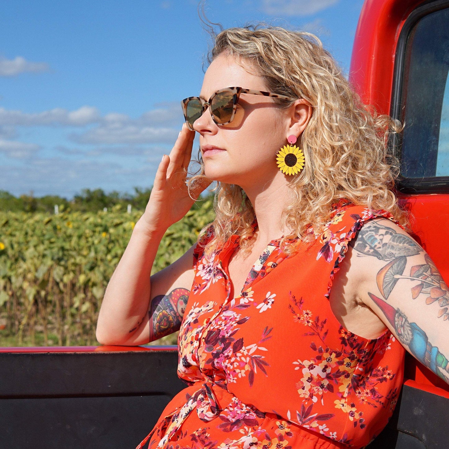 Girl wearing Sunflower Dangle Earrings