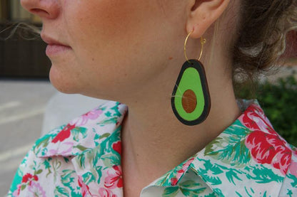 Girl Wearing Avocado Hoop Earrings