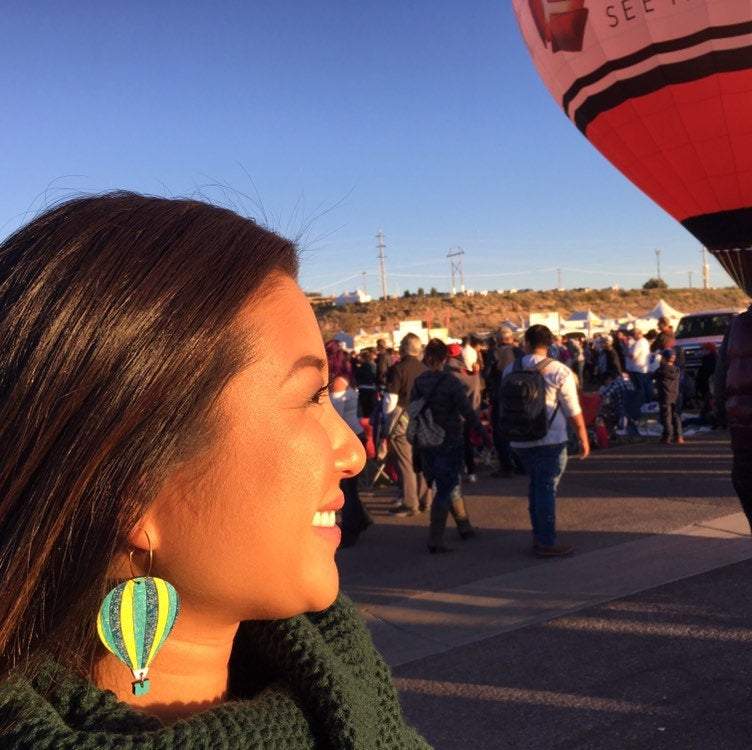 Girl Wearing Hot Air Balloon Earrings, Balloo Fiesta Earring