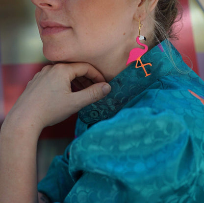 Girl wearing Neon Flamingo Hoops Earrings