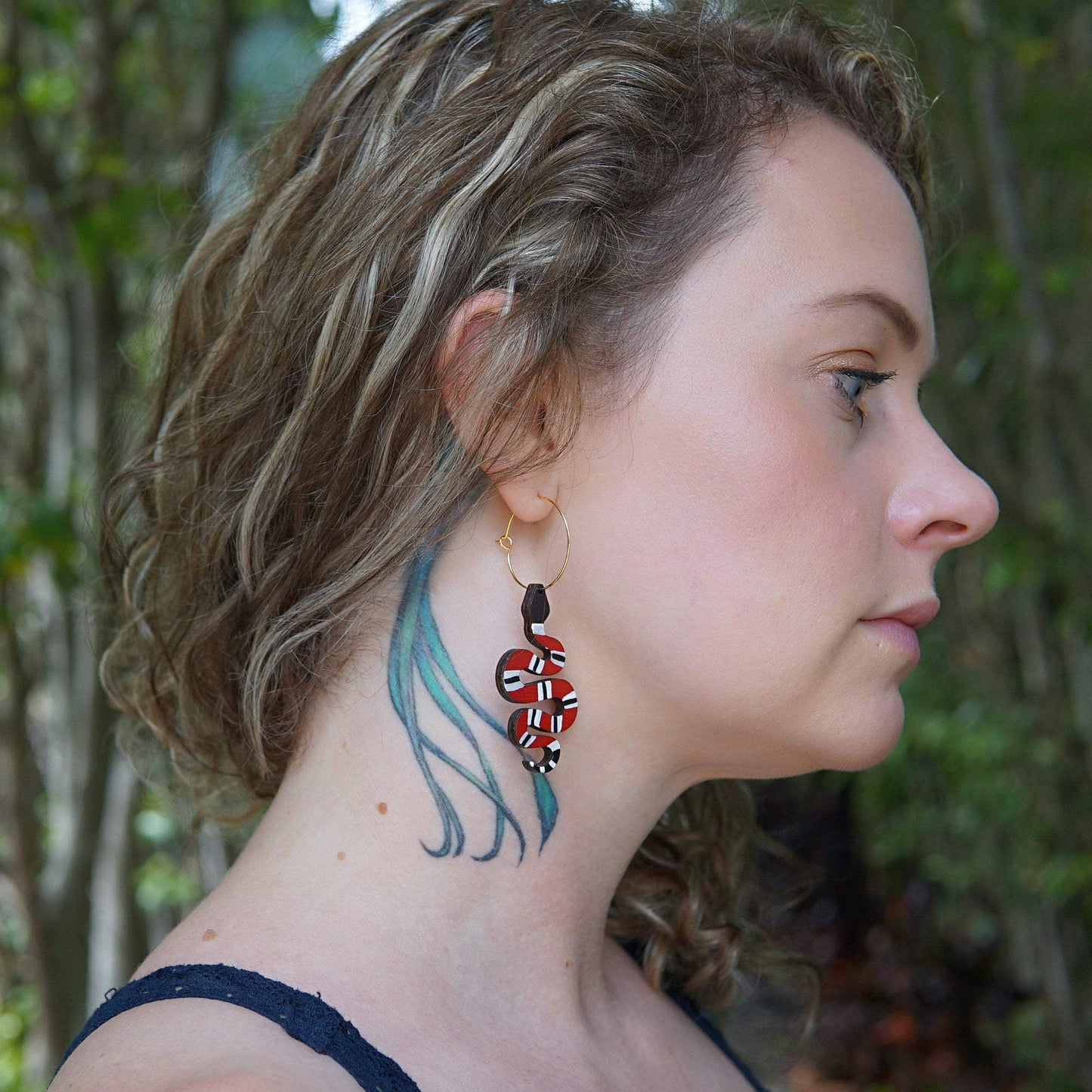 Girl wearing Red Snake Hoop Earrings