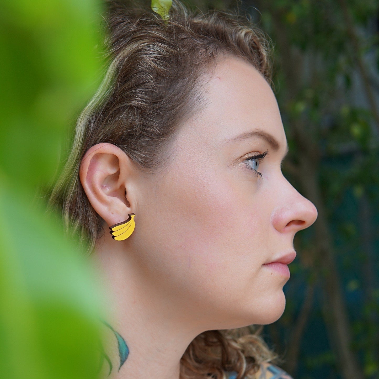 Girl wearing banana earrings