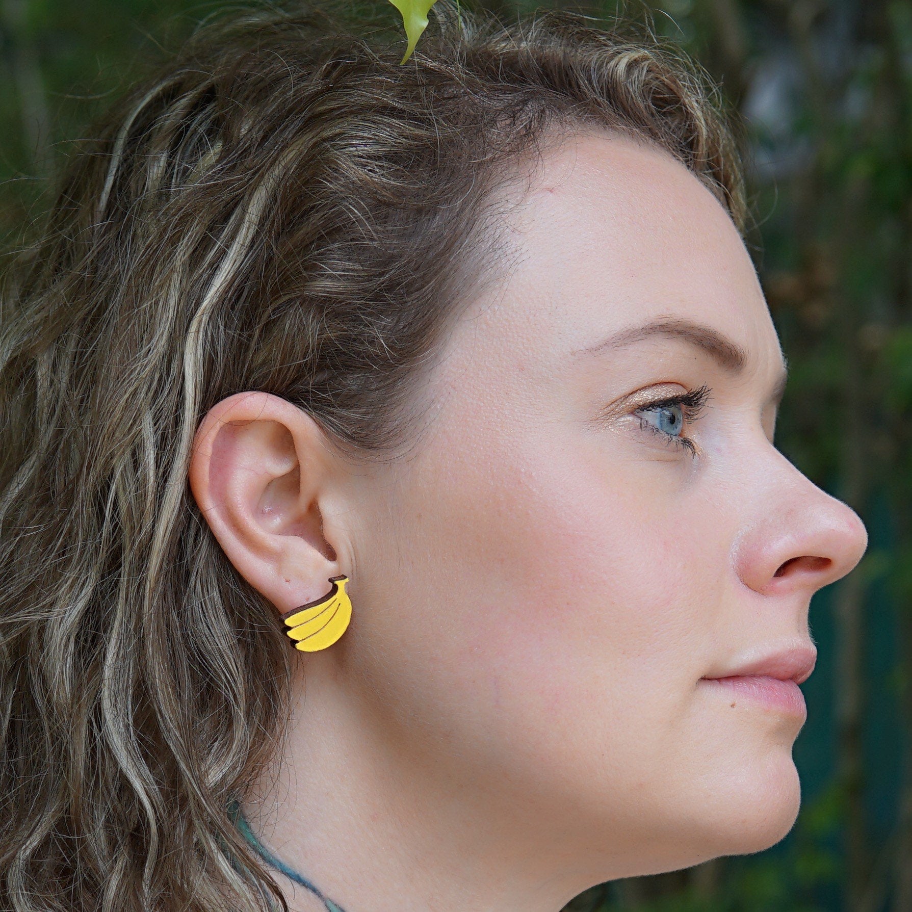 Girl wearing banana earrings